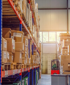 Image of heavy-duty racks in a warehouse loaded with boxes.