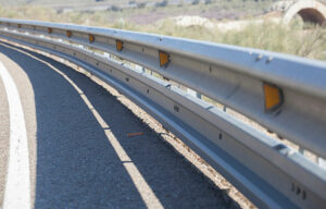 W-beam crash barriers and guardrails along highways.